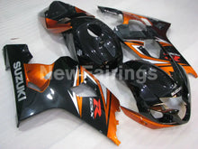 Carica l&#39;immagine nel visualizzatore di Gallery, Black and Orange Factory Style - GSX-R600 04-05 Fairing Kit